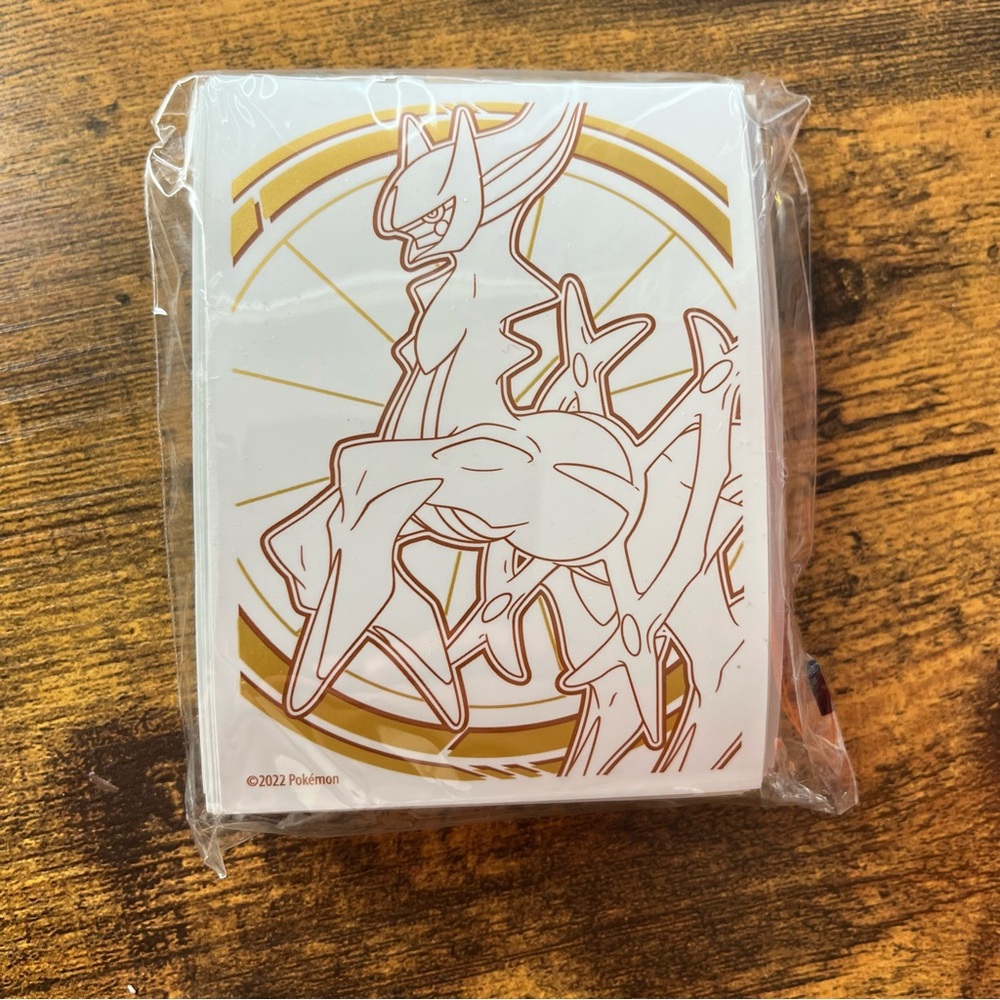 One (1) Pack of Sealed Pokemon Brilliant Stars Card Sleeves, White Gold, 65 Ct